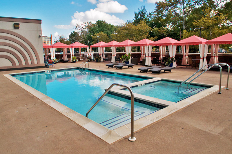 A closeup photo of the Metroclub condominium building's pool.